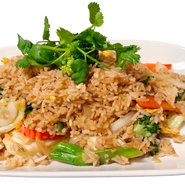 A close-up of Royal Thai Orchid's fried rice with broccoli, carrots, onions, and cilantro.